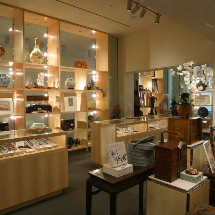 View of the museum boutique with books, jewelry, artwork and other items on display.