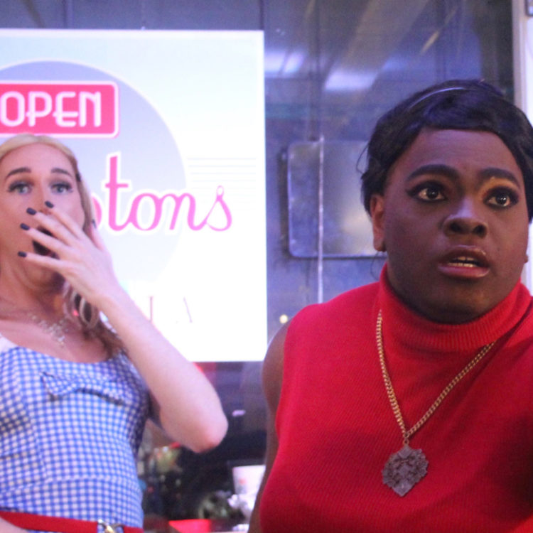Two people with shocked expressions on their faces.
