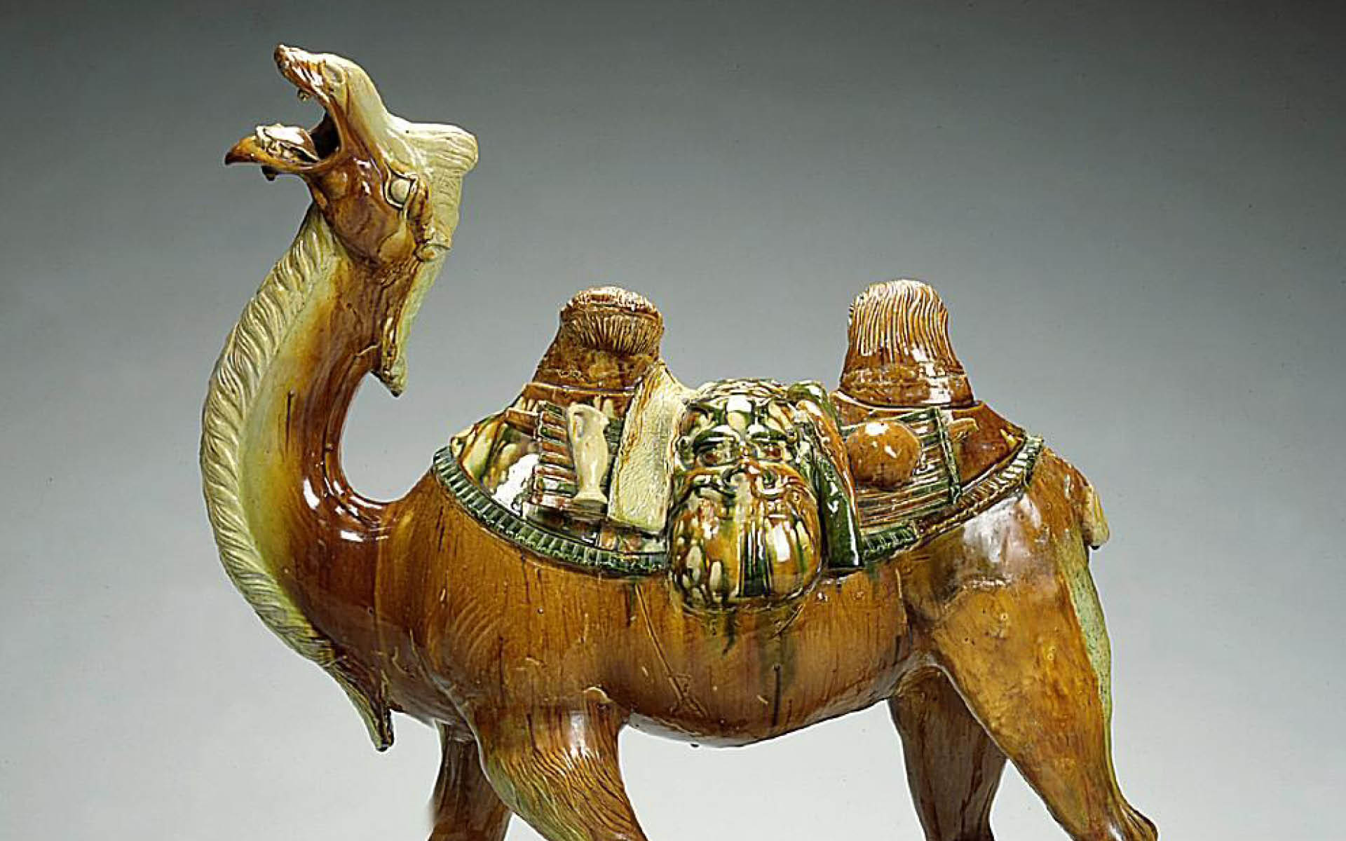 Glazed ceramic camel.