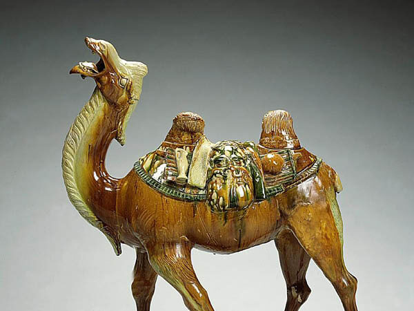 Glazed ceramic camel.