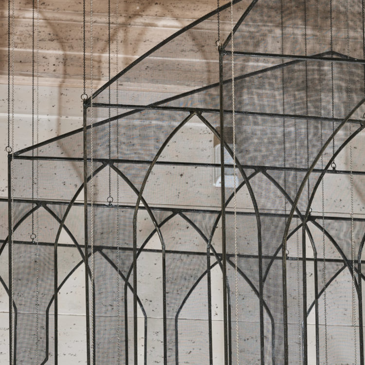 Installation view of My House, My Tomb, 2015/2021, by Afruz Amighi (American, b. Iran, 1974). Steel with fiberglass mesh, metal chains, and LED light. Lent by the artist. Photograph © Asian Art Museum.